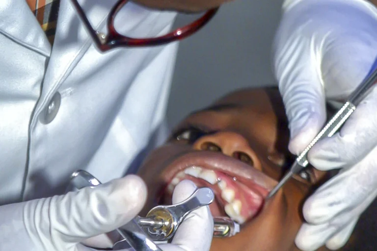 Dentist performing dental procedure in Lagos Nigeria